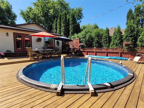 351 Seneca Street, Portage La Prairie, MB - Outdoor With Above Ground Pool With Deck Patio Veranda With Backyard