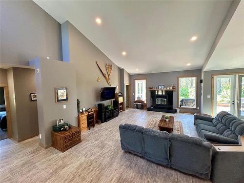 30126 48E Road, Marchand, MB - Indoor Photo Showing Living Room With Fireplace