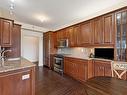 Cuisine - 302-5840 Av. Marc-Chagall, Côte-Saint-Luc, QC  - Indoor Photo Showing Kitchen 