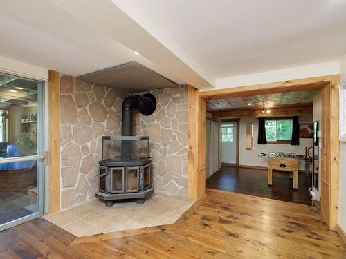 Autre - 2950 Ch. D'Entrelacs, Entrelacs, QC - Indoor Photo Showing Other Room With Fireplace