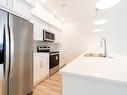 113-8960 Dallas Drive E, Kamloops, BC  - Indoor Photo Showing Kitchen With Double Sink 