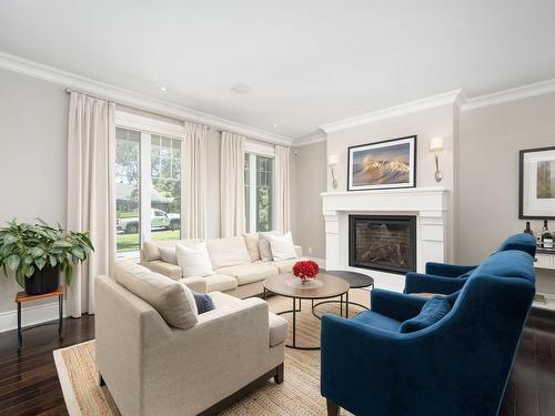 Living room - 69 Av. Kirkwood, Beaconsfield, QC - Indoor Photo Showing Living Room With Fireplace