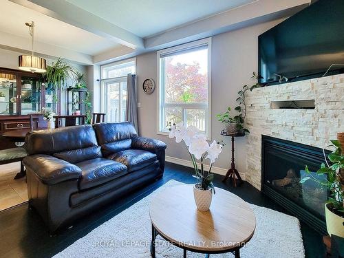 110 Marina Point Cres, Hamilton, ON - Indoor Photo Showing Living Room With Fireplace