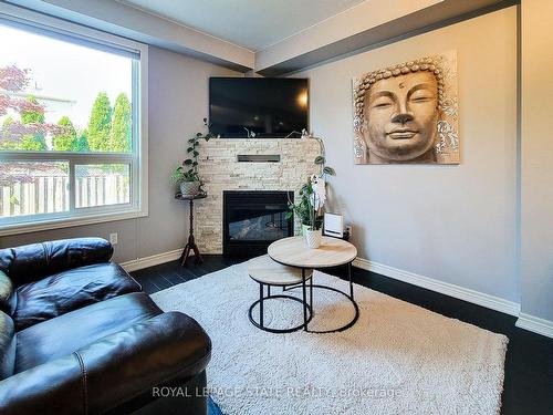 110 Marina Point Cres, Hamilton, ON - Indoor Photo Showing Living Room With Fireplace