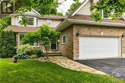 Lovely curb appeal and nestled among mature trees. - 24 Mary Hill Crescent, Richmond, ON - Outdoor