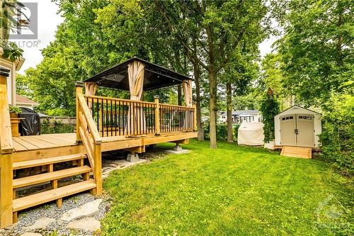 You don't get yards like this in the city anymore! - 24 Mary Hill Crescent, Richmond, ON - Outdoor With Deck Patio Veranda With Backyard
