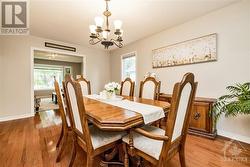 Plenty of room for furniture and guests in the spacious dining room. - 