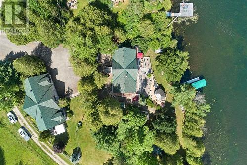 Main Residence with 3-bay Garage that includes a 1-bedroom rental unit, recreation room, office space & gym - 320 Pike Lake - 12 Route, Perth, ON - Outdoor With Body Of Water With View