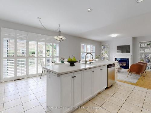 10 Bayfield Dr, Richmond Hill, ON - Indoor Photo Showing Kitchen With Fireplace