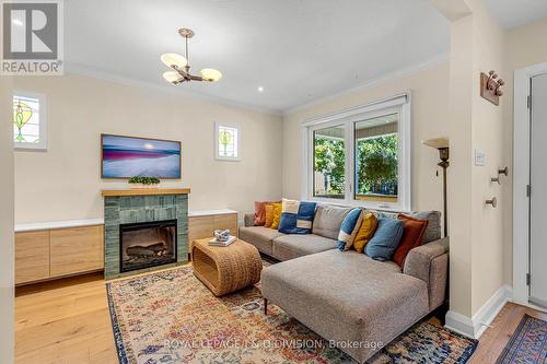 252 Fulton Avenue, Toronto, ON - Indoor Photo Showing Living Room With Fireplace