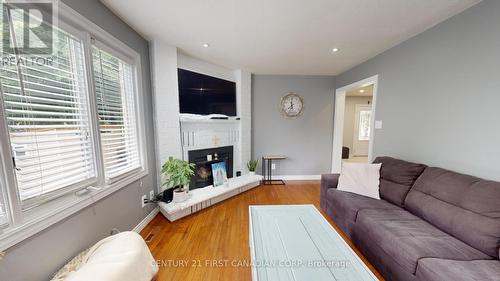 217 Colette Drive, London, ON - Indoor Photo Showing Living Room With Fireplace