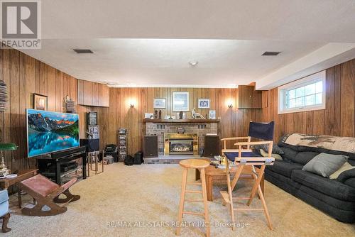 86 Clifton Street, Kawartha Lakes, ON - Indoor Photo Showing Living Room With Fireplace