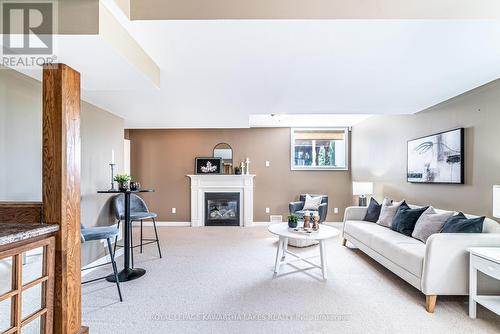 19 Logan Lane, Kawartha Lakes, ON - Indoor Photo Showing Living Room With Fireplace