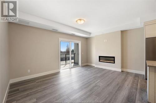 190 Main Street East Unit# 302, Kingsville, ON - Indoor Photo Showing Living Room With Fireplace