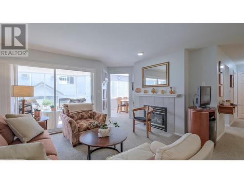 254 Scott Avenue Unit# 202, Penticton, BC - Indoor Photo Showing Living Room With Fireplace