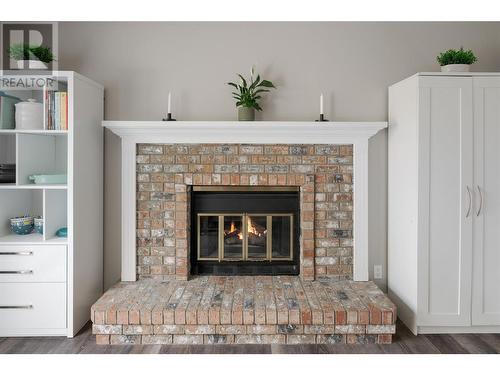 1180 Wintergreen Crescent, Kelowna, BC - Indoor Photo Showing Living Room With Fireplace