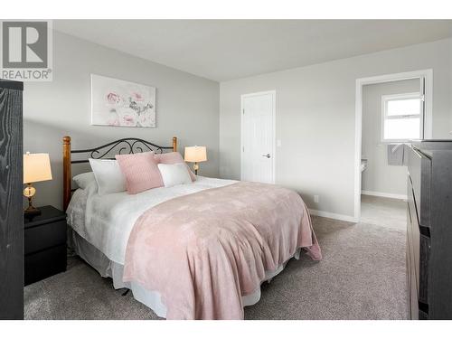 1180 Wintergreen Crescent, Kelowna, BC - Indoor Photo Showing Bedroom