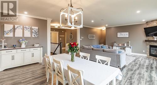 2 Mountain View Drive, Holyrood, NL - Indoor Photo Showing Dining Room With Fireplace