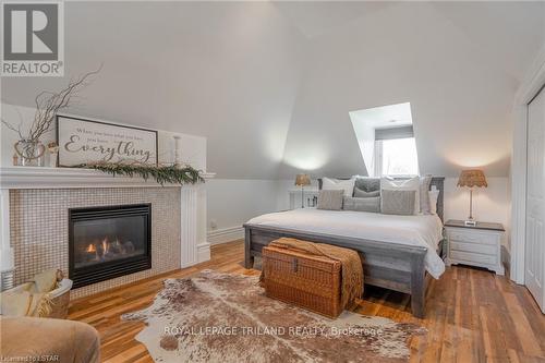 4221 Colonel Talbot Road, London, ON - Indoor Photo Showing Bedroom With Fireplace