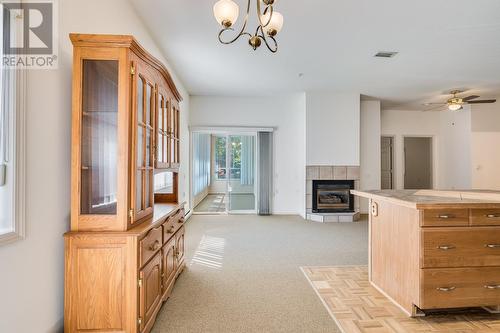 920 Saskatoon Road Unit# 118, Kelowna, BC - Indoor Photo Showing Other Room With Fireplace