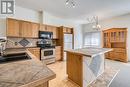 920 Saskatoon Road Unit# 118, Kelowna, BC  - Indoor Photo Showing Kitchen With Double Sink 