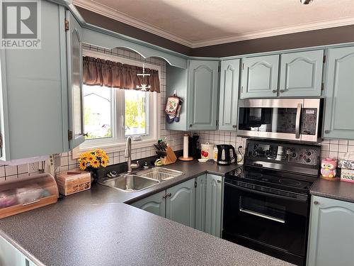 30 Jamison Avenue, Grand Bank, NL - Indoor Photo Showing Kitchen With Double Sink