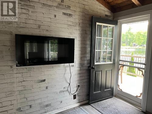 744C Marble Point Road, Marmora And Lake, ON - Indoor With Fireplace