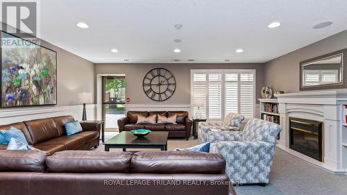 908 - 250 Pall Mall Street, London, ON - Indoor Photo Showing Living Room With Fireplace