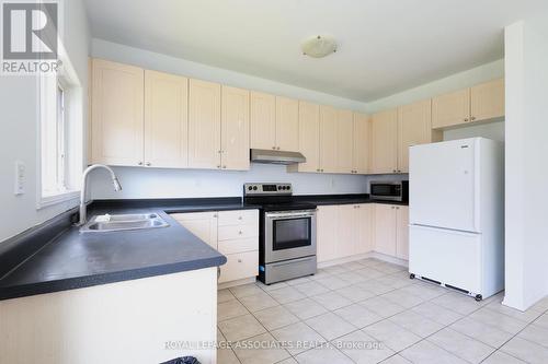 1998 Secretariat Place N, Oshawa, ON - Indoor Photo Showing Kitchen With Double Sink