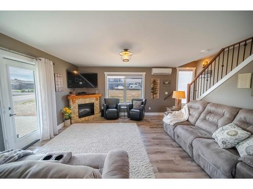 1617 Koocanusa Lake Drive, Lake Koocanusa, BC - Indoor Photo Showing Living Room With Fireplace