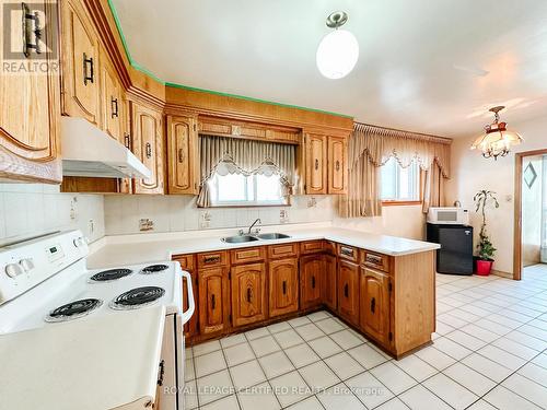 18 Vimy Avenue, Toronto, ON - Indoor Photo Showing Kitchen With Double Sink