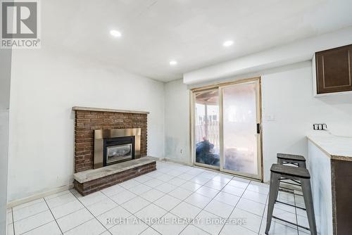 655 Bloor Street E, Oshawa, ON - Indoor Photo Showing Living Room With Fireplace