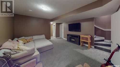 5403 Green Silverberry Drive E, Regina, SK - Indoor With Fireplace