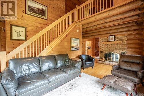 937 Indian Point Road, Evansville, ON - Indoor Photo Showing Living Room With Fireplace