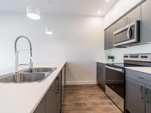 114-8960 Dallas Drive, Kamloops, BC - Indoor Photo Showing Kitchen With Double Sink With Upgraded Kitchen