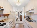 406-1041 Rockland Ave, Victoria, BC  - Indoor Photo Showing Kitchen With Double Sink 