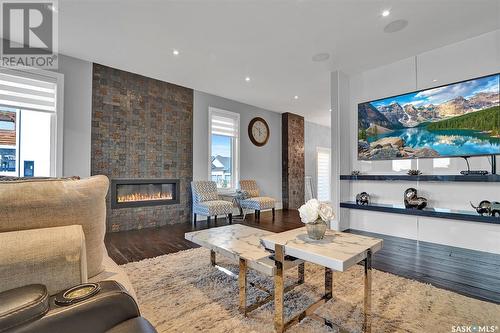 3433 Green Brook Road, Regina, SK - Indoor Photo Showing Living Room With Fireplace