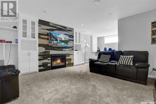 3433 Green Brook Road, Regina, SK - Indoor Photo Showing Living Room With Fireplace