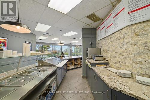 100 - 700 Dorval Drive, Oakville, ON 