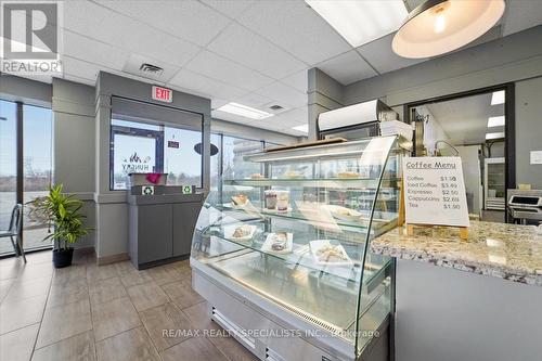 100 - 700 Dorval Drive, Oakville, ON 