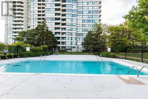 2407 - 550 Webb Drive, Mississauga, ON - Outdoor With In Ground Pool With Facade