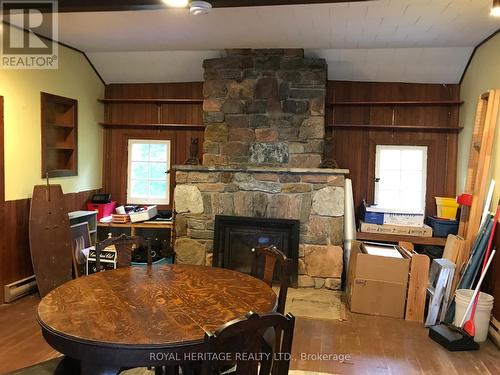 14 Major Street, Kawartha Lakes, ON - Indoor Photo Showing Dining Room With Fireplace