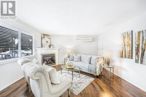 7 Norris Arm, Innisfil, ON - Indoor Photo Showing Living Room With Fireplace