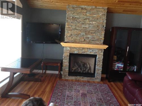 706 Maclachlan Avenue, Manitou Beach, SK - Indoor Photo Showing Living Room With Fireplace