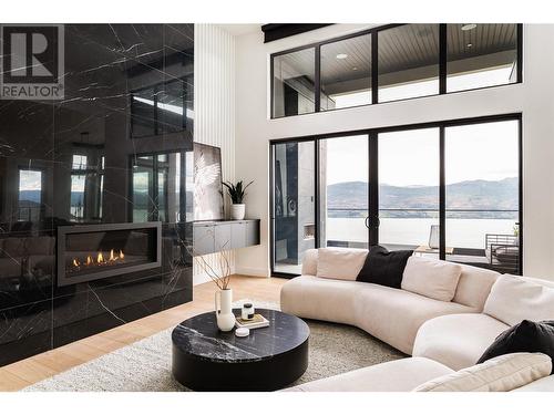 1412 Vineyard Drive, West Kelowna, BC - Indoor Photo Showing Living Room With Fireplace