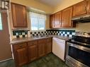 4828 Scott Avenue, Terrace, BC  - Indoor Photo Showing Kitchen With Double Sink 