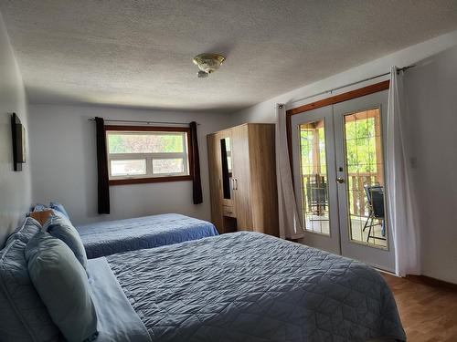 316 3Rd Avenue Nw, Nakusp, BC - Indoor Photo Showing Bedroom