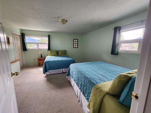 316 3Rd Avenue Nw, Nakusp, BC - Indoor Photo Showing Bedroom