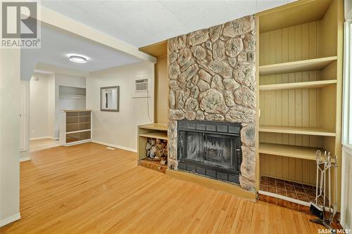 2048 Argyle Street, Regina, SK - Indoor Photo Showing Living Room With Fireplace