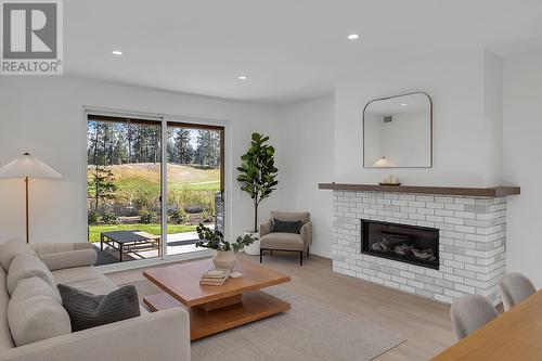 1979 Country Club Drive Unit# 6, Kelowna, BC - Indoor Photo Showing Living Room With Fireplace